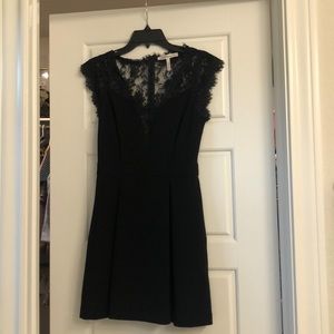 Super flattering Black cocktail dress!